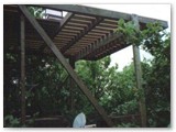 Side of deck above treehouse roof